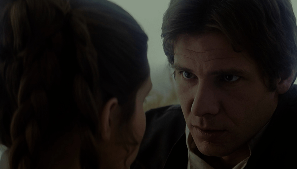 Carrie Fisher e Harrison Ford in una scena del film Star Wars: L'impero colpisce ancora (1980) diretto da George Lucas 