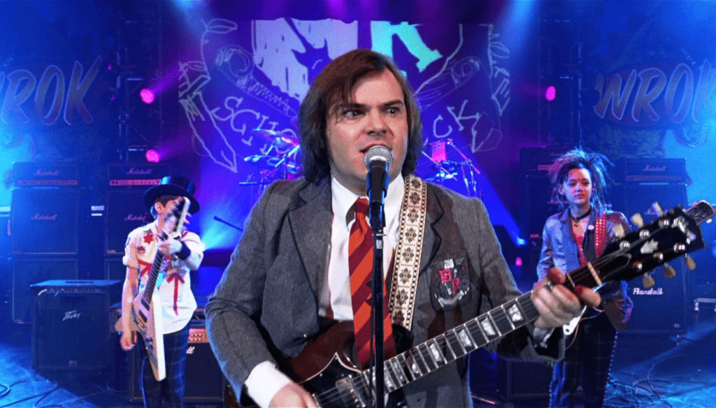 Jack Black, Rebecca Julia Brown e Joey Gaydos Jr. in una scena di School of Rock (2003) di Richard Linklater