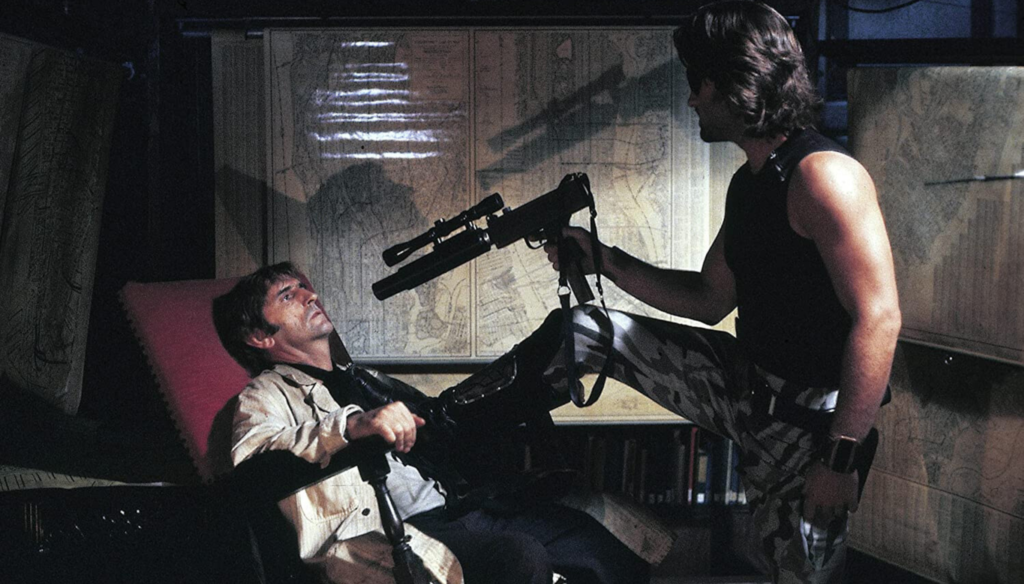 Kurt Russel e Harry Dean Stanton in una scena di 1997: Fuga da New York (1981) di John Carpenter