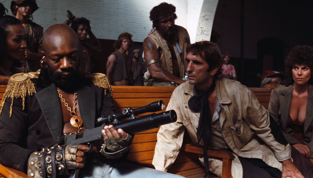 Isaac Hayes e Harry Dean Stanton in una scena di 1997: Fuga da New York (1981) di John Carpenter